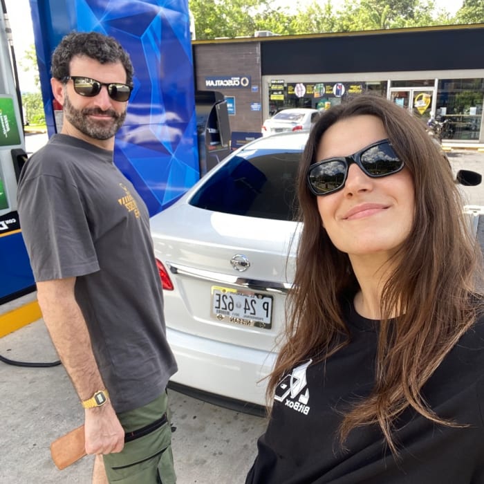 car in El Salvador being filled up with bitcoins