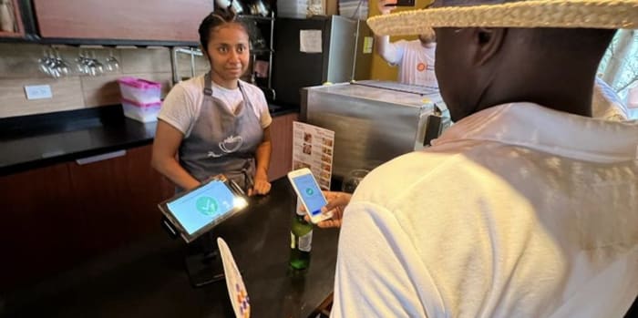 After installing the Lightning wallets, participants were able to begin transacting in bitcoin, and some opted to purchase coffee and coconuts from this particular vendor.