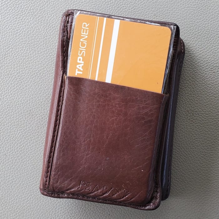 Tapsigner NFC-based bitcoin hardware wallet.