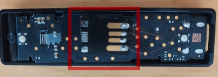 Back of tampered Ledger hardware wallet, red square by Grove. Source: BleepingComputer.