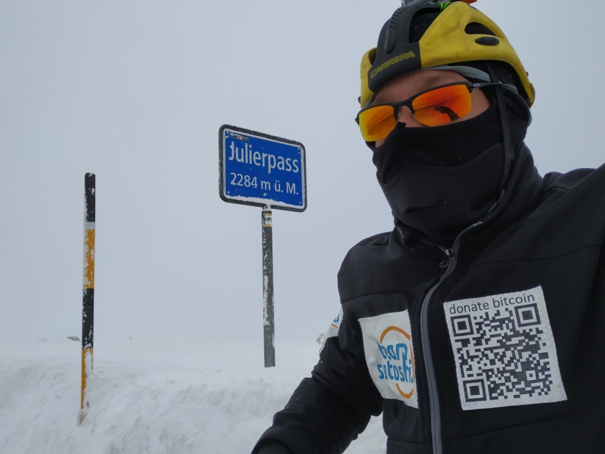 man skiing wearing bitcoin sweater