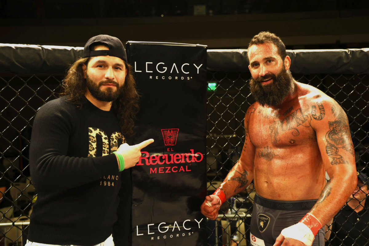 Gamebred Fighting Championship CEO Jorge Masvidal inside Legacy Records sponsored cage 