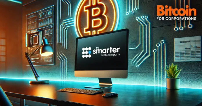 web designer office desk with glowing lights and the smarter web company logo